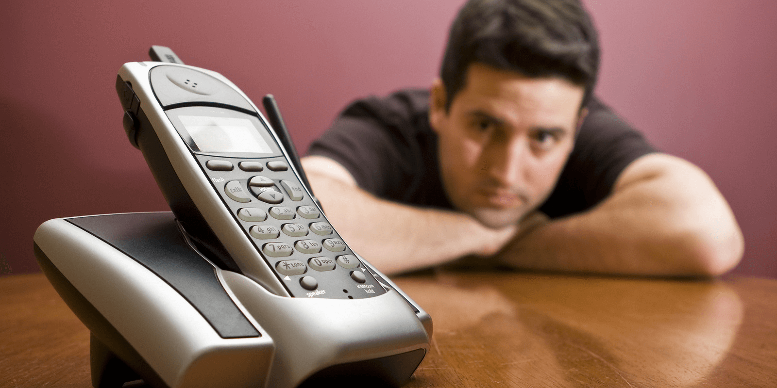 phone-not ringing man watching phone